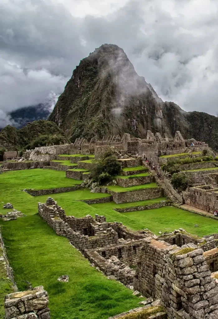 Incan ruins of Machu Picchu with Huayna Picchu mountain backdrop.